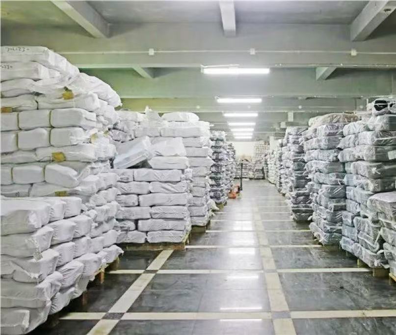 Organized warehouse with yarn inventory